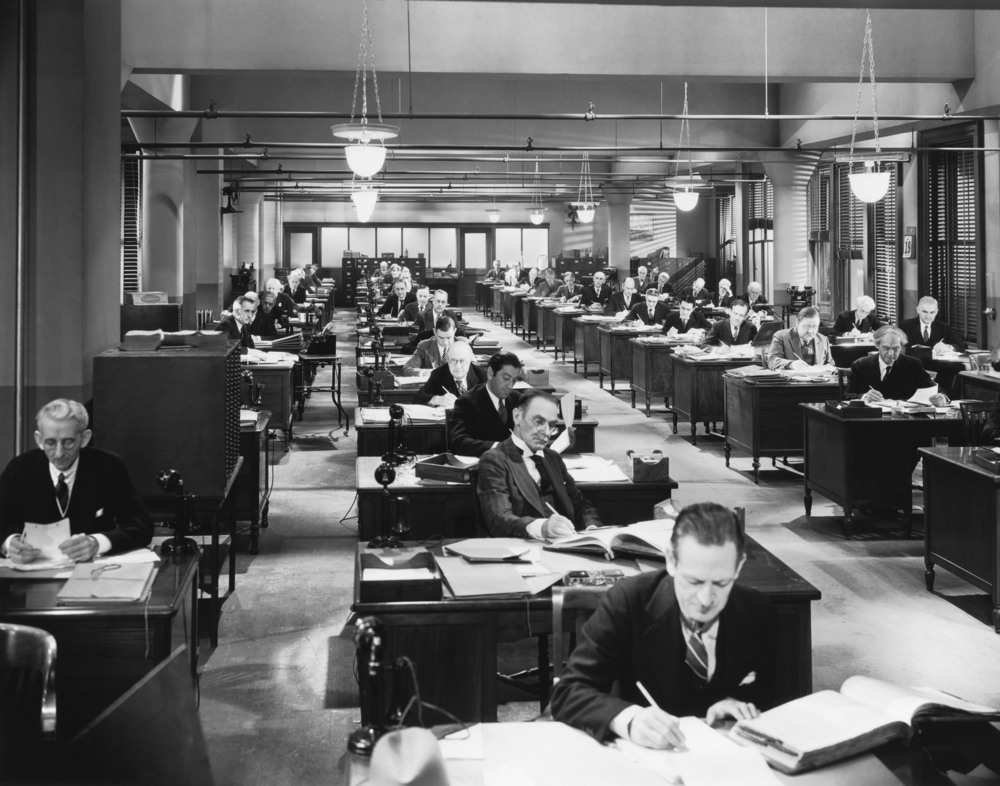 Historic office with many workers